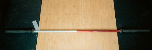 Picture of RED AND WHITE OLYMPIC BAR WITH BLACK ENDS 220CM